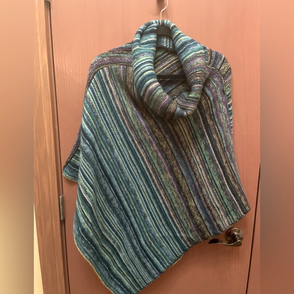 Vividly striped One size Poncho with a cowled neckline by Tickled Pink.
